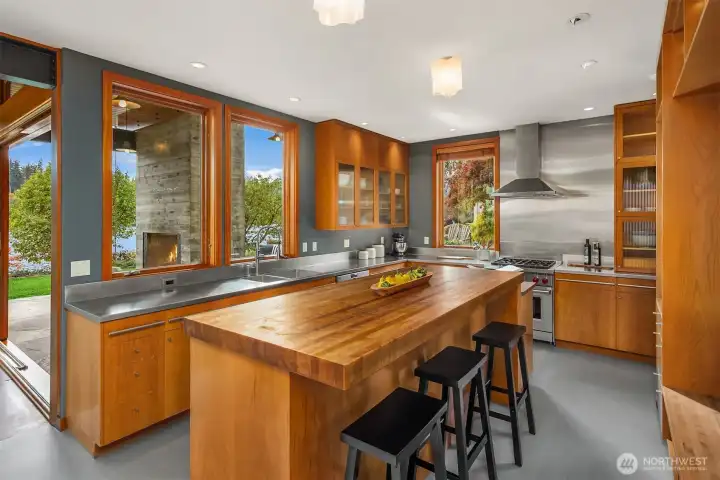 Gather at the wood-topped center island.