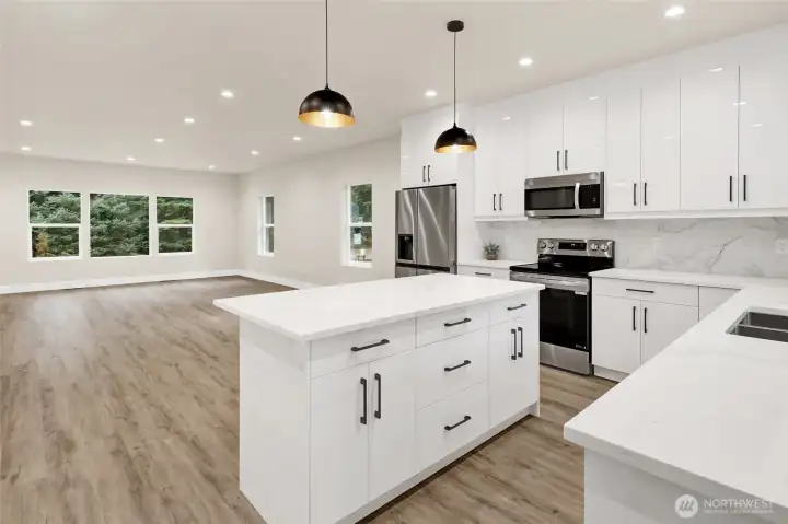 Spacious dining area extends from the bright open kitchen