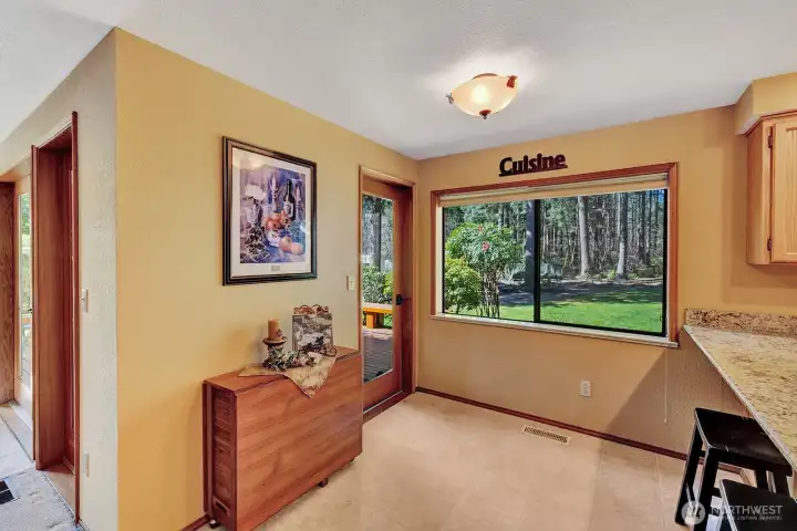 Breakfast nook with access to deck
