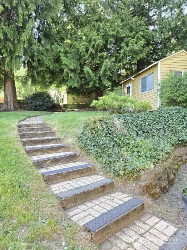 Terraced steps to shed and shop.