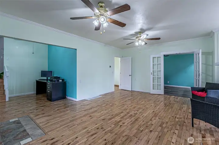 Primary bedroom with private full bath is on the main floor thru open door on the left.