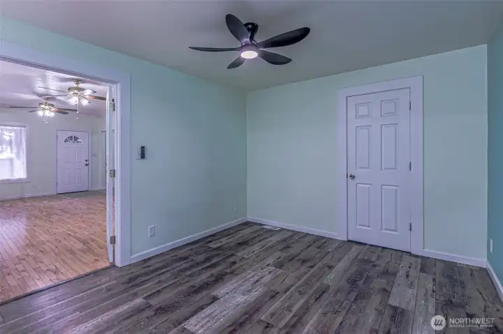 Dining room with French doors open to the living room.
