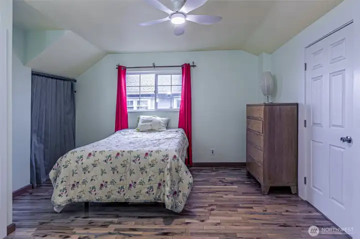 Main floor primary Suite with bathroom to the right.
