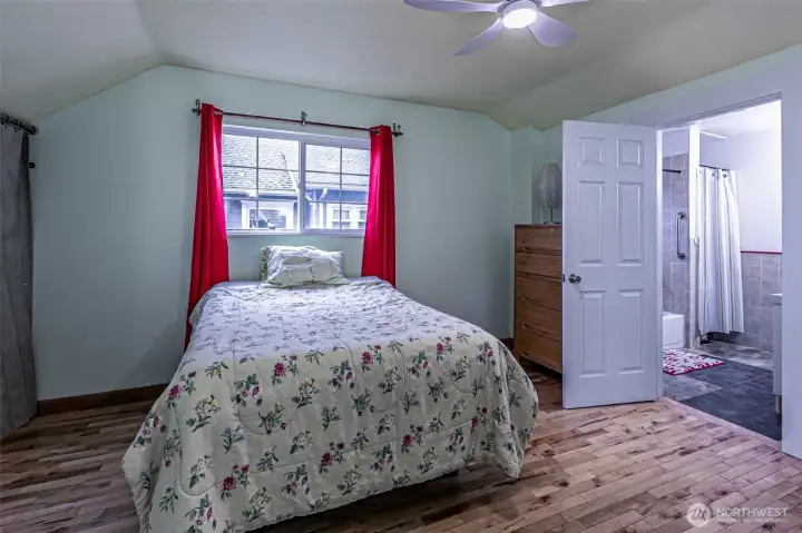 Primary bedroom second view.   PLEASE NOTE there is a second bedroom on the main fllor not pictured that has an outside door entrance that might be helpful for a business owner.
