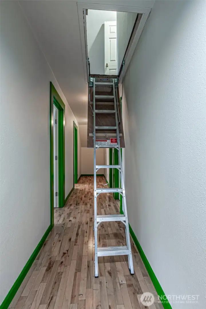 Attic staircase pulled down.