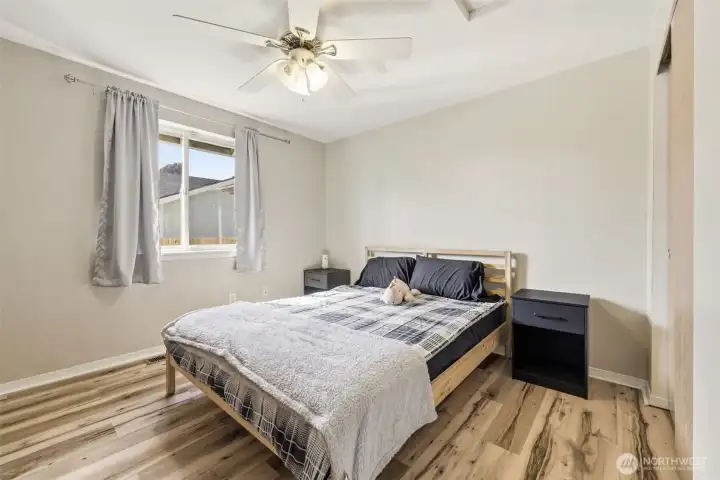 Spacious secondary bedroom offering versatility and comfort—ideal for a home office, exercise area, hobby space, or simply a relaxing personal space.