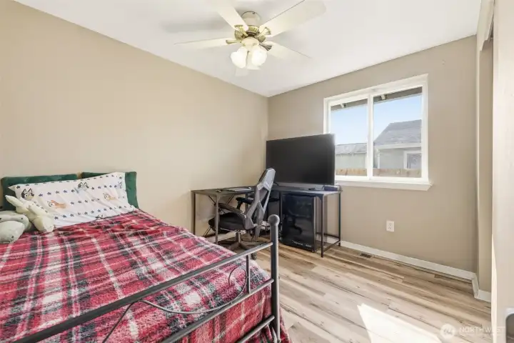 Generously sized bedroom with plenty of natural light—perfect as a cozy retreat, guest room, or flexible space for an office, craft room, or home gym.