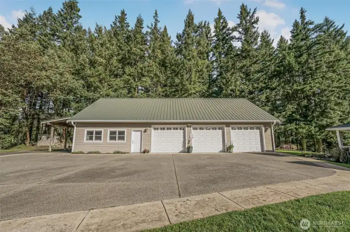 Unmatched utility awaits in the 2000+sqft detached garage/shop, complete with a vehicle hoist, radiant heated floors and a dedicated studio/storage space.