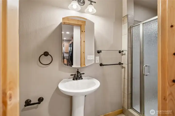 Convenient main-floor 3/4 bath adds comfort and functionality for guests and daily living.