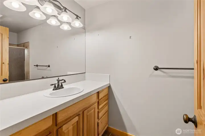 Clean, well-maintained bathroom with thoughtful finishes.