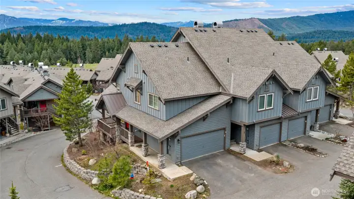 Charming mountain architecture blends seamlessly with the natural surroundings.