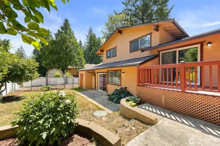 Back of house with both sliding glass doors.
