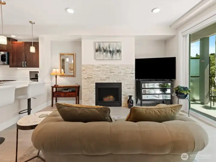 Comfortable living space with a gas fireplace, breakfast bar, and 9 foot ceilings! Comfortable living space with a gas fireplace, breakfast bar, and 9 foot ceilings!