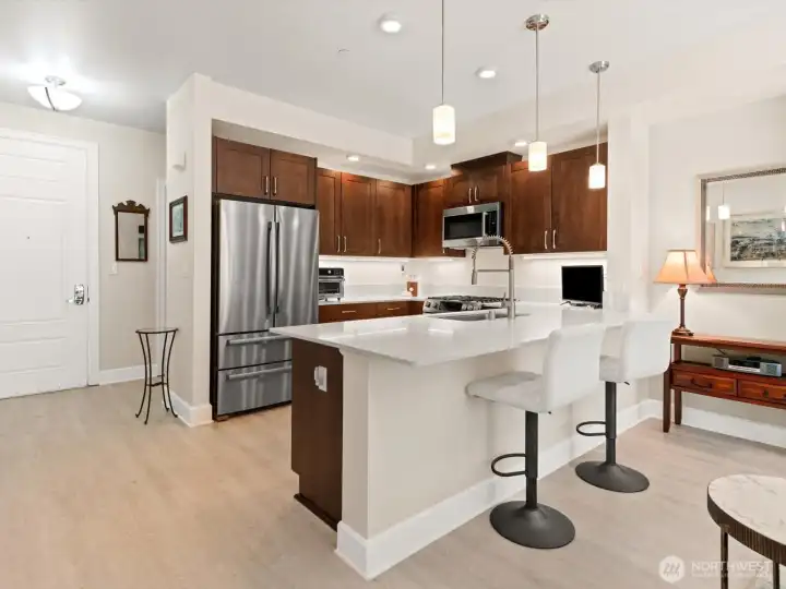 Soft- close cabinets and quartz counters with the undermount lighting create a great environment for the chef in the home. Soft- close cabinets and quartz counters with the undermount lighting create a great environment for the chef in the home.