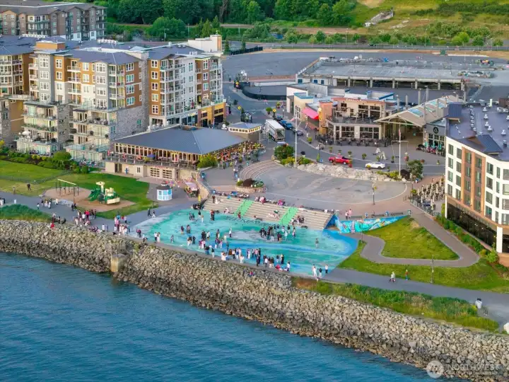 The center of Point Ruston features restaurants, a splash park, playground and theater. The center of Point Ruston features restaurants, a splash park, playground and theater.