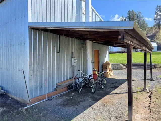 Lean-to off the rear of the garage.