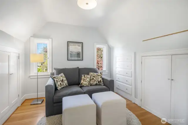 This cozy alcove is part of the primary bedroom with abundant closet space