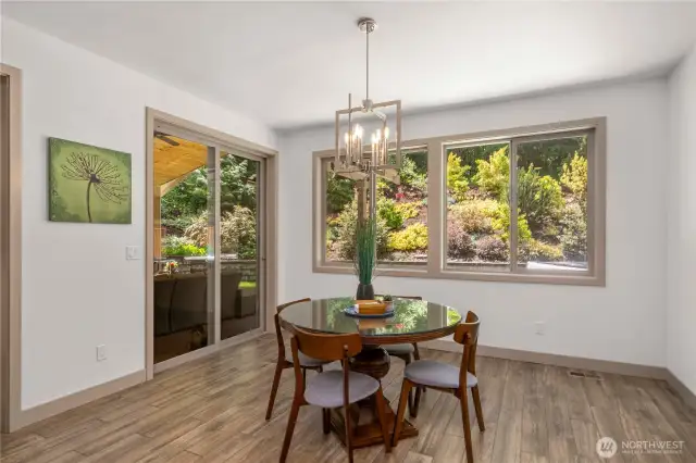 Off the sits a dining area with direct access to the backyard