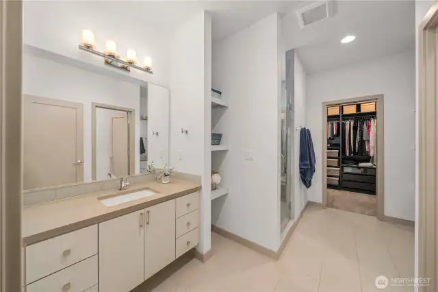 Two vanities, that are separate + an impressively sized walk-in closet