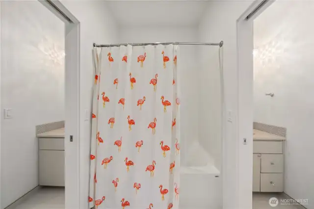 Separate vanities and full tub!