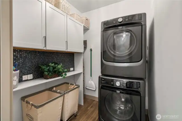 Washer and dryer stay! Located just off the mudroom is this handy laundry room!
