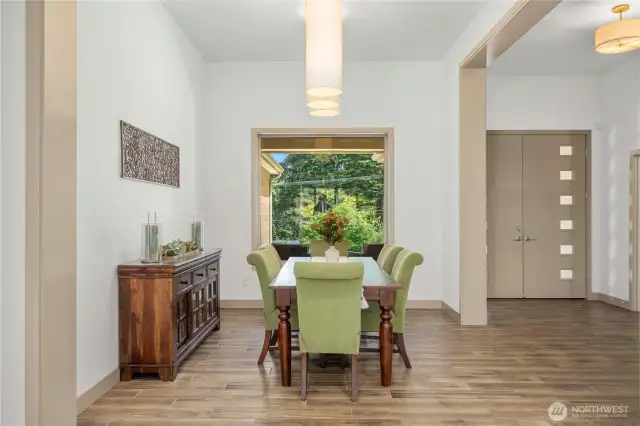 Immediately to your right the dining area greets you - perfect for those who love to host!