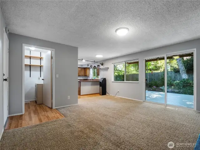 The family room opens to the backyard via a large slider that leads to the freshly painted wood deck.