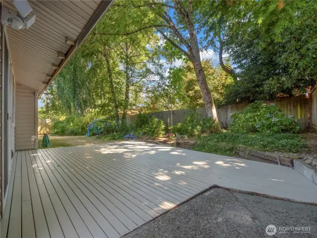 The large back deck offers a wonderful place to entertain guests or relax after a long work day.