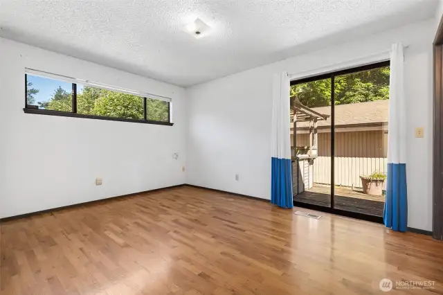 Primary suite w/ 3/4 bath and patio to rear courtyard