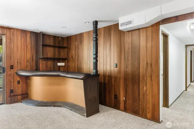 Wet bar in great room w/ stove (tucked away under the counter)