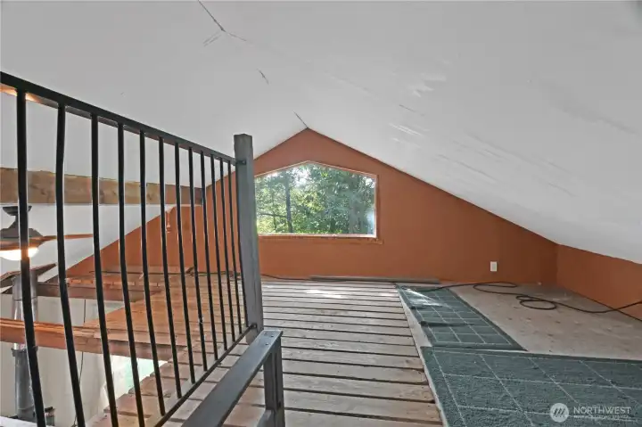 Loft overlooking the living room give's many options