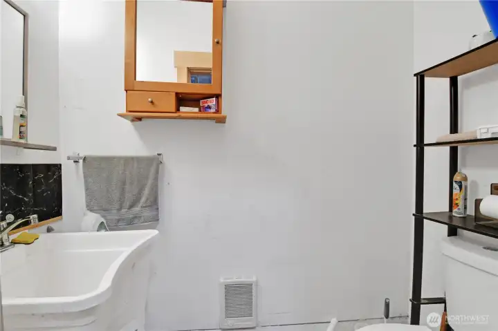 Half bath in garage.