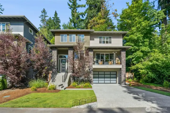 Modern sophistication meets timeless design in this stunning 5-bedroom, 4-bath Northwest contemporary nestled in the desirable Holmes Point / Denny Park community.