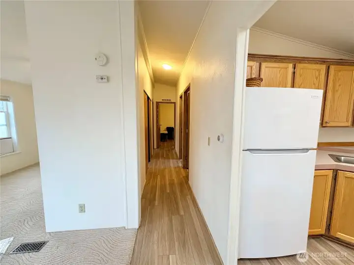 Hallway to Back Door & Bedrooms/Bath-New Vinyl Plank Flooring
