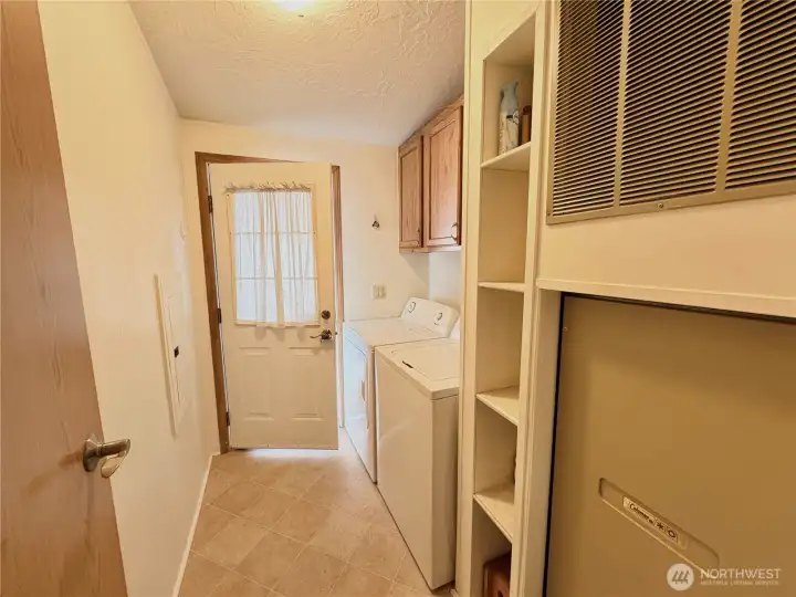 Hallway to Carport w/Laundry & Storage