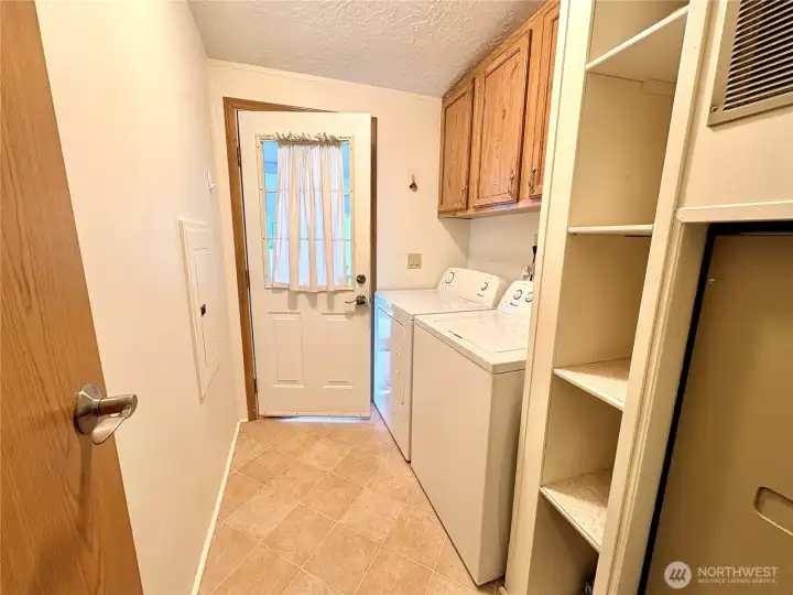 Hallway to Carport w/Laundry & Storage