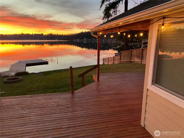 Enjoy sun all day and breathtaking sunsets from this spectacular west-facing lake home.