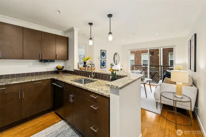 View toward living area and private covered balcony beyond.