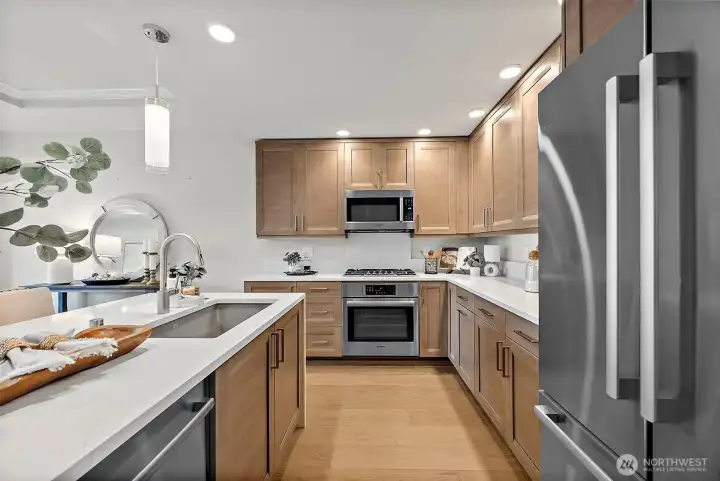 Dishwasher and undermount kitchen sink located situated in the island