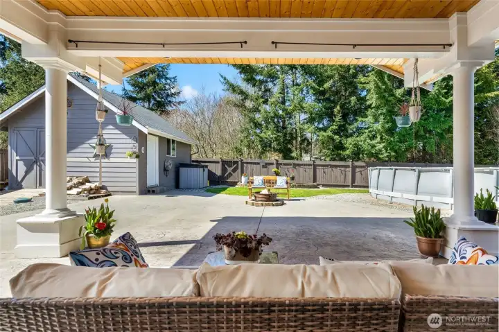 covered patio with heaters and surround sound