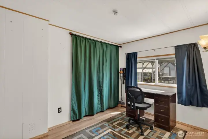 Second bedroom ideal for guests, office, or flex space.