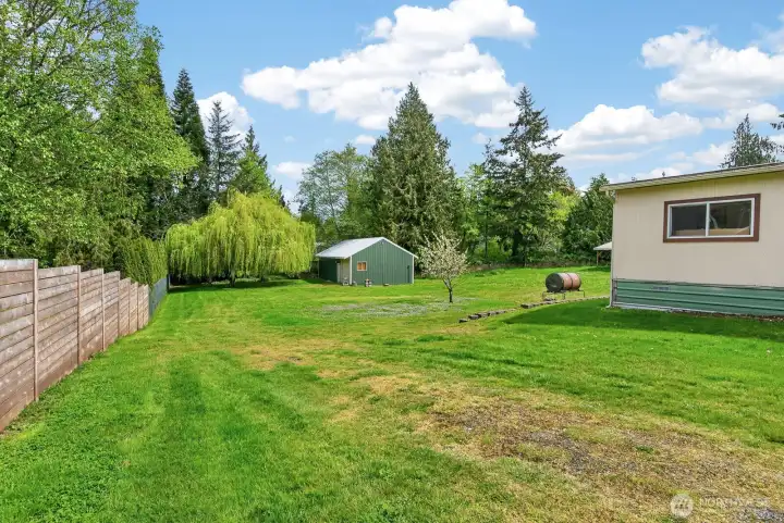 Expansive shy half-acre lot with space to garden and enjoy the outdoors.