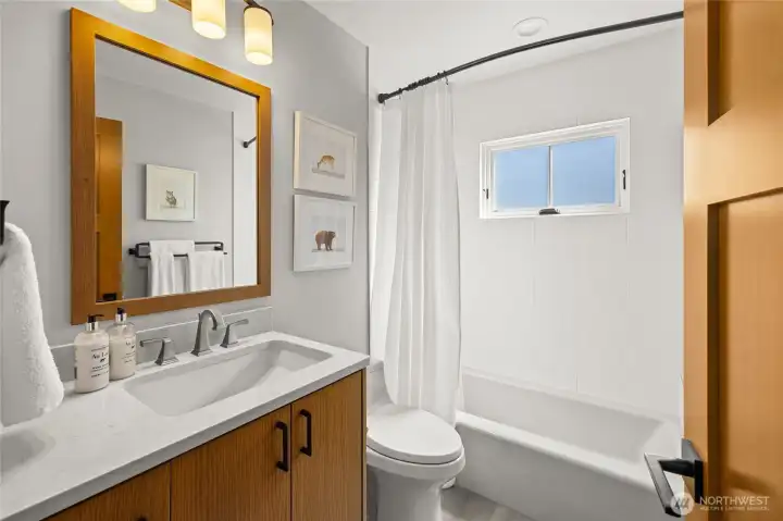 Upstairs full bath conveniently located next to the guest bedroom.