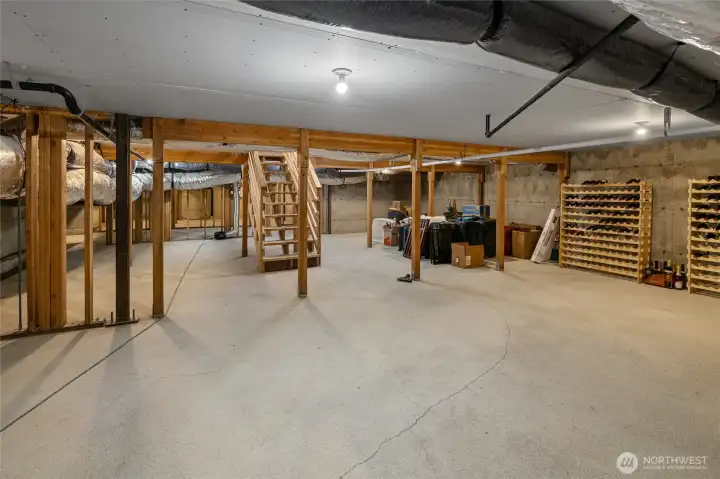 Downstairs area currently used for storage, offering potential for a variety of future uses