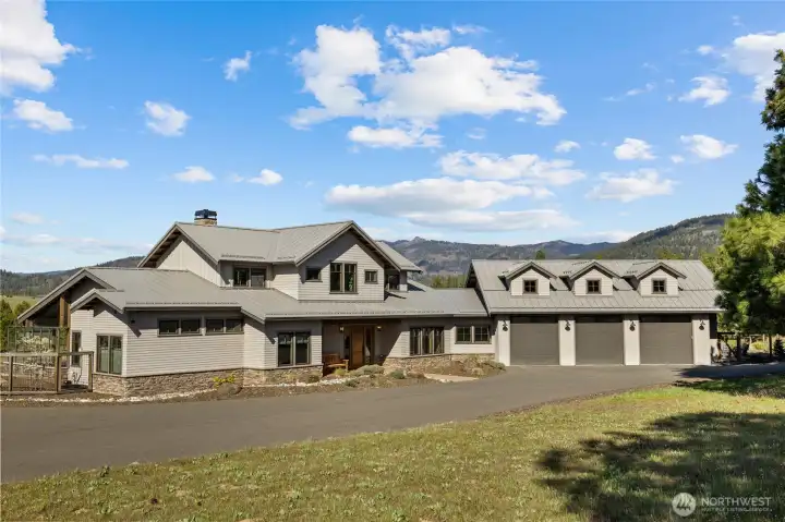 This gorgeous home features an oversized three-car garage and stunning views throughout.