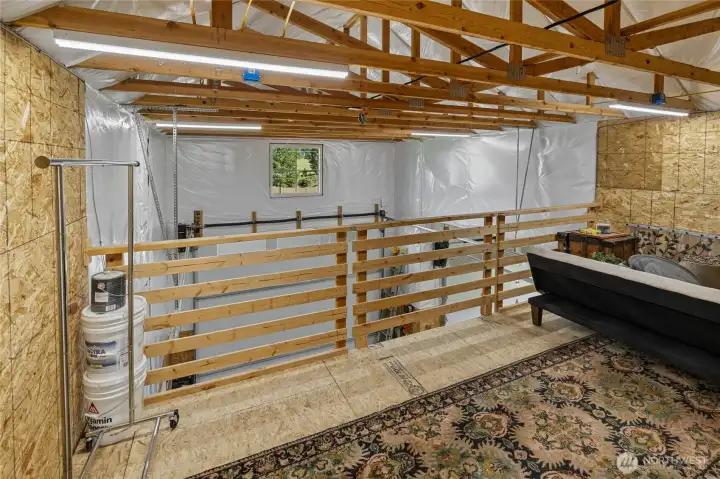 The railing collapses for added convenience, and the area can be used for additional storage overflow