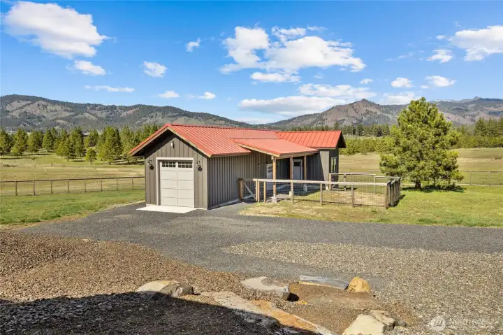 Additional building, the Studio Barn (currently known as the “Goat Barn”), featuring a single-car garage, space for small animals, and a studio area ideal for art or yoga. All furnishings included.