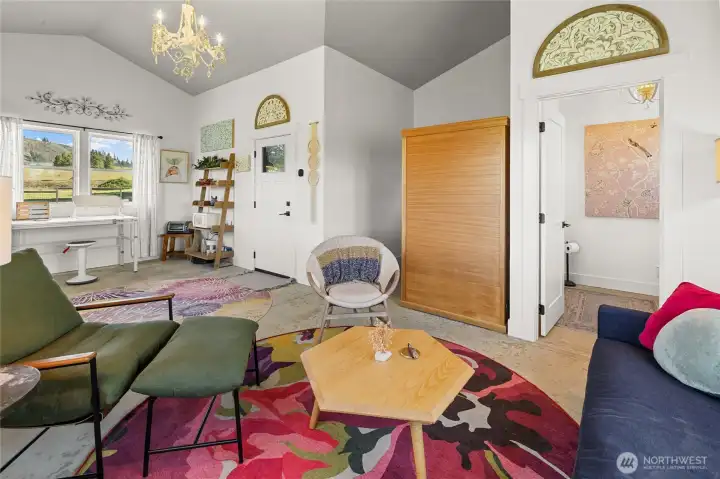 Inside this charming studio barn—perfect for guest overflow or creating your own peaceful zen space.