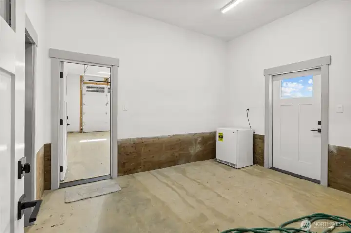 Area offers multiple uses, with a door that open to a fully fenced-in space.