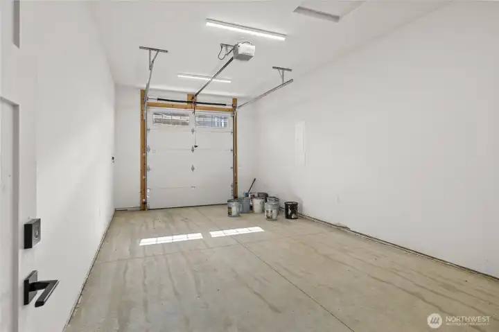 Single-car garage attached to the studio barn.